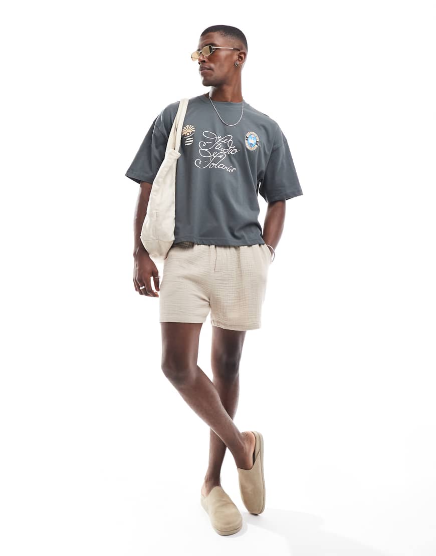 ASOS DESIGN - Boxy Fit Oversize-T-Shirt in Anthrazit mit Sport-Print-Grau ASOS DESIGN - Boxy Fit Oversize-T-Shirt in Anthrazit mit Sport-Print-Grau von ASOS DESIGN