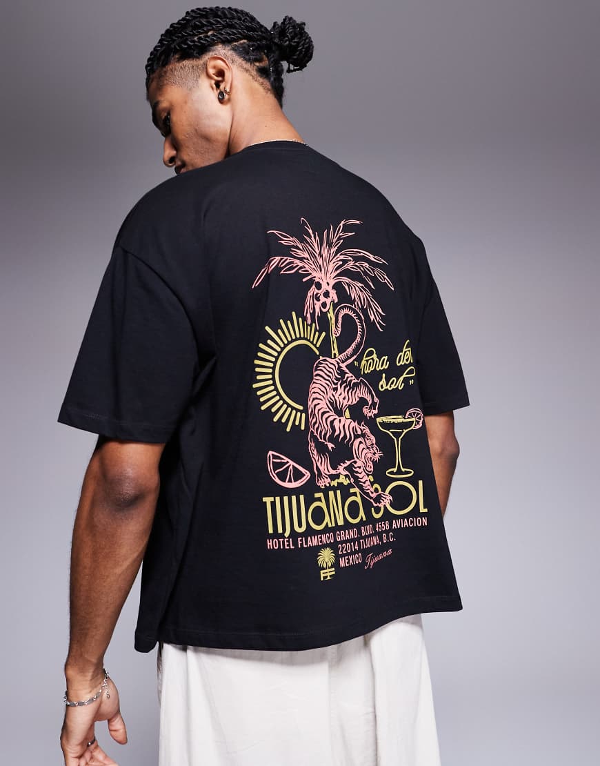 ASOS DESIGN - Boxy Fit Oversize-T-Shirt in Schwarz mit Souvenir-Grafik ASOS DESIGN - Boxy Fit Oversize-T-Shirt in Schwarz mit Souvenir-Grafik von ASOS DESIGN