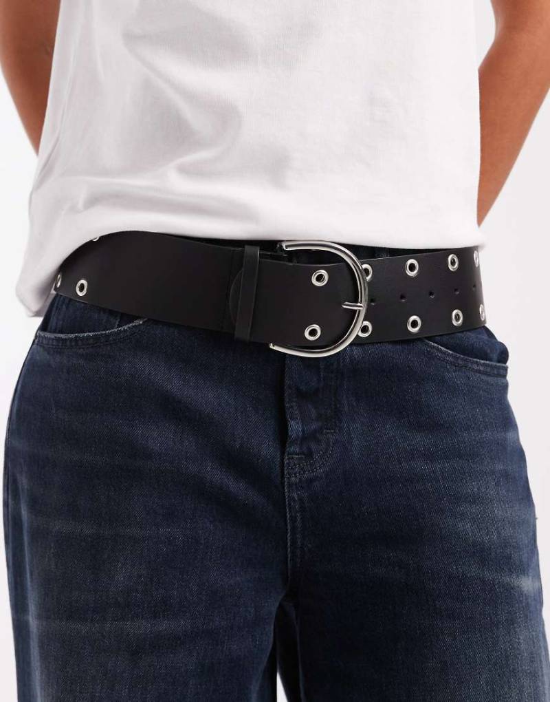 ASOS DESIGN - Breiter Gürtel für tiefsitzenden Taillenbund in Schwarz mit Ösen-Verzierungen von ASOS DESIGN