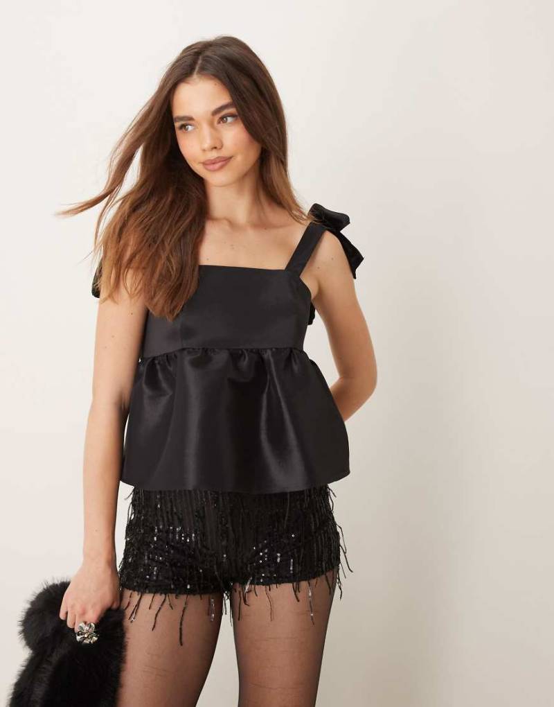 ASOS DESIGN - Camisole-Oberteil aus Samt und Taft in Schwarz mit Schleife an der Schulter ASOS DESIGN - Camisole-Oberteil aus Samt und Taft in Schwarz mit Schleife an der Schulter von ASOS DESIGN