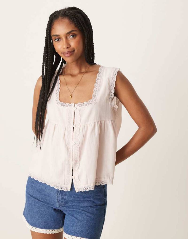 ASOS DESIGN - Babydoll-Oberteil in Hellrosa aus Baumwolle mit Spitzen-Besatz von ASOS DESIGN
