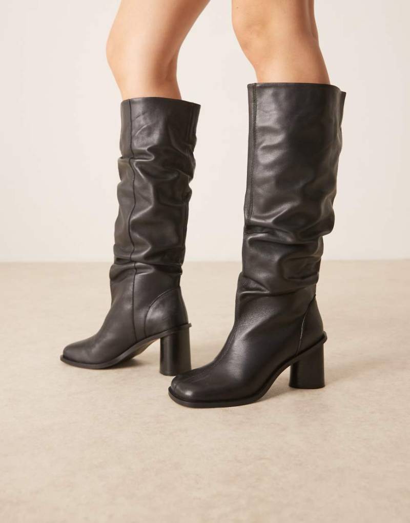 ASOS DESIGN - Carolina - Kniehohe Lederstiefel in Schwarz mit weichem Schaft und Absatz von ASOS DESIGN