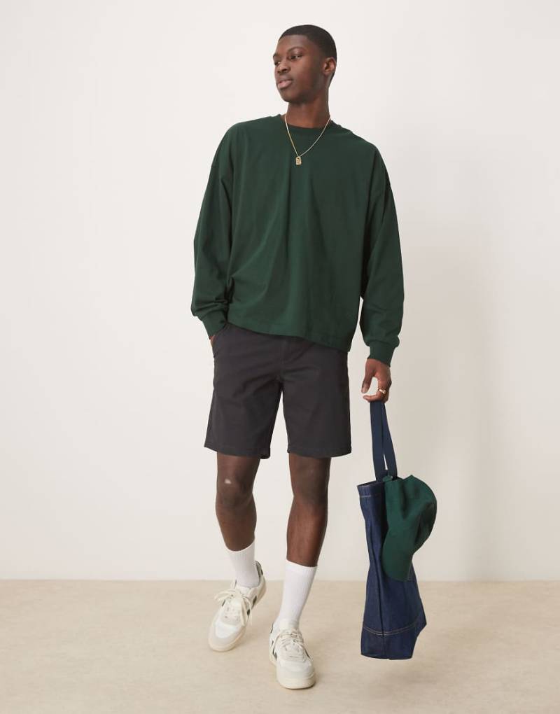 ASOS DESIGN - Chino-Shorts in Schwarz in normaler Länge mit schmalem Schnitt von ASOS DESIGN