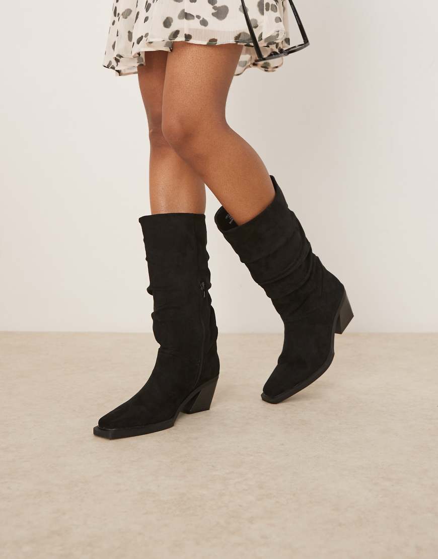 ASOS DESIGN - Chosen - Kniehohe Cowboystiefel aus Wildlederimitat in Schwarz mit lockerem Schaft von ASOS DESIGN
