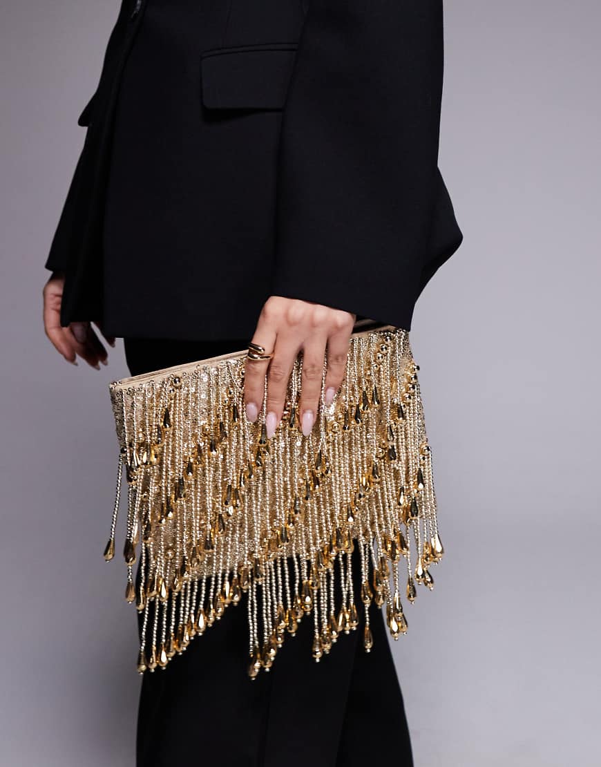 ASOS DESIGN - Clutch in Goldoptik mit Tropfenverzierung und Reißverschluss oben-Goldfarben von ASOS DESIGN