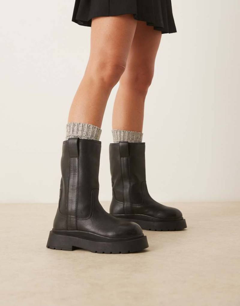 ASOS DESIGN - Coast - Stiefel zum Hineinschlüpfen aus Leder in Schwarz mit dicker Sohle von ASOS DESIGN
