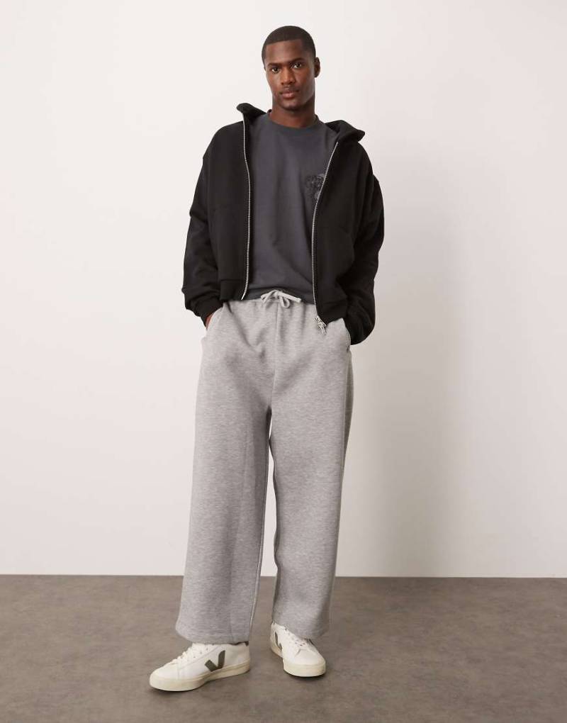 ASOS DESIGN - Cropped-Jogginghose in Grau meliert mit weitem Bein von ASOS DESIGN