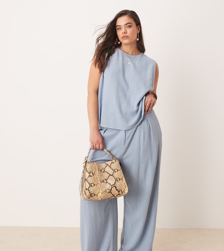 ASOS DESIGN Curve - Hose in Blau mit Leinenanteil, Bundfalte und weitem Bein, Kombiteil ASOS DESIGN Curve - Hose in Blau mit Leinenanteil, Bundfalte und weitem Bein, Kombiteil von ASOS DESIGN