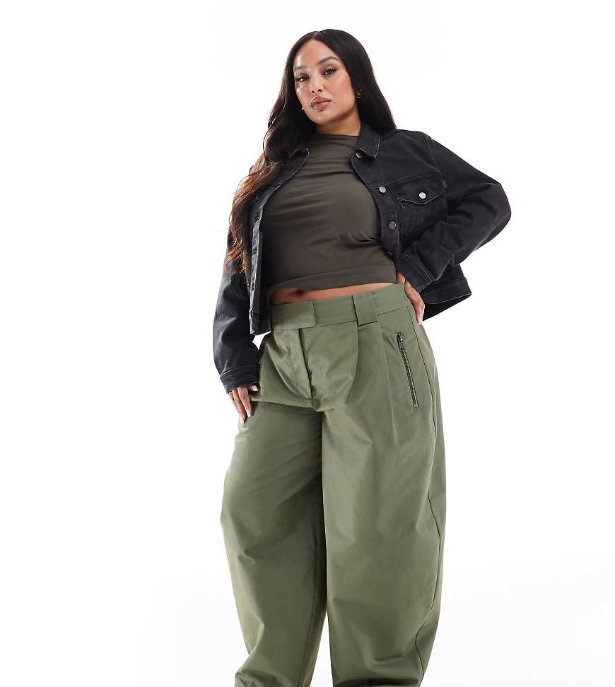 ASOS DESIGN Curve - Hose in Khaki mit abgerundetem Beinschnitt und Reißverschluss-Grün ASOS DESIGN Curve - Hose in Khaki mit abgerundetem Beinschnitt und Reißverschluss-Grün von ASOS DESIGN