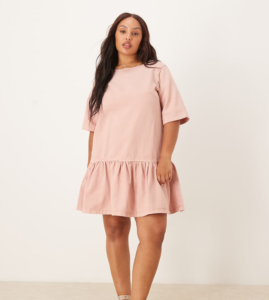 ASOS DESIGN Curve - Kurzes T-Shirt-Kleid aus rosa Denim mit tiefer Taille ASOS DESIGN Curve - Kurzes T-Shirt-Kleid aus rosa Denim mit tiefer Taille von ASOS DESIGN