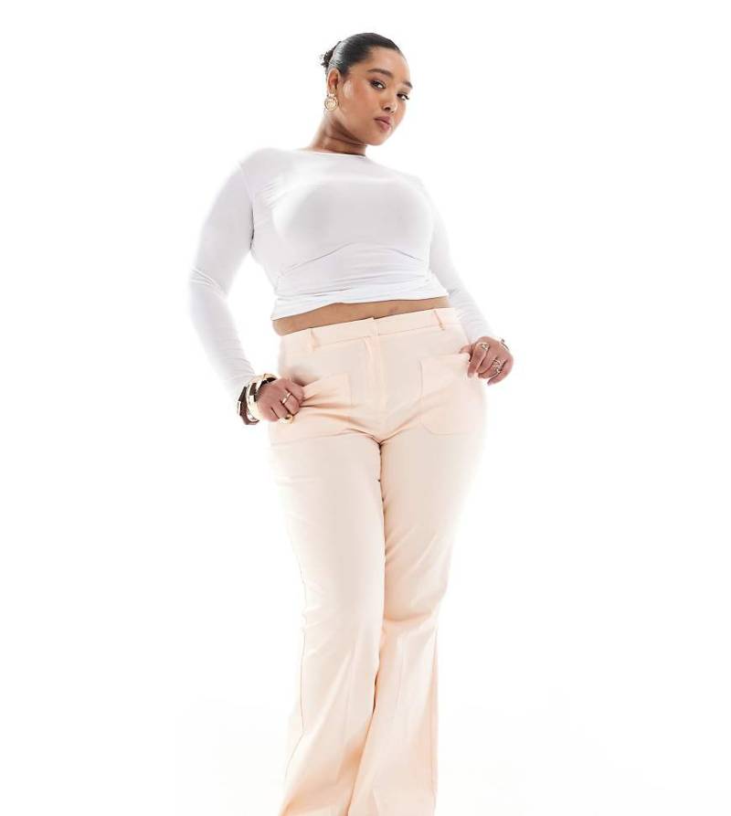 ASOS DESIGN Curve - Schlaghose in Apricot mit aufgesetzter Tasche-Orange von ASOS DESIGN