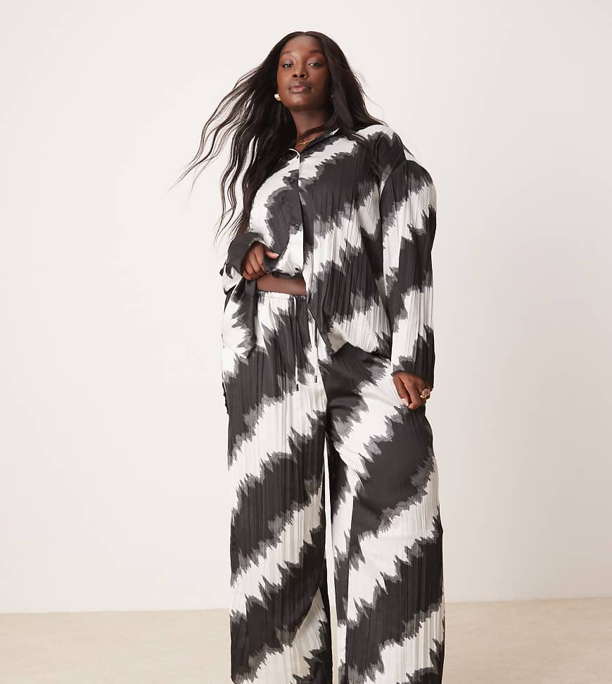 ASOS DESIGN Curve - Weit geschnittene Plissee-Hose mit schwarz-weißem Muster, Kombiteil-Bunt von ASOS DESIGN