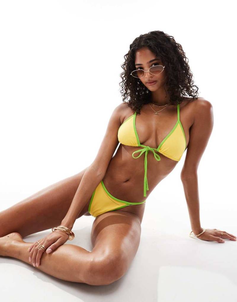 ASOS DESIGN - Dani - Gerippte Tanga-Bikinihose in Grün und Gelb mit kontrastierender Einfassung-Bunt von ASOS DESIGN