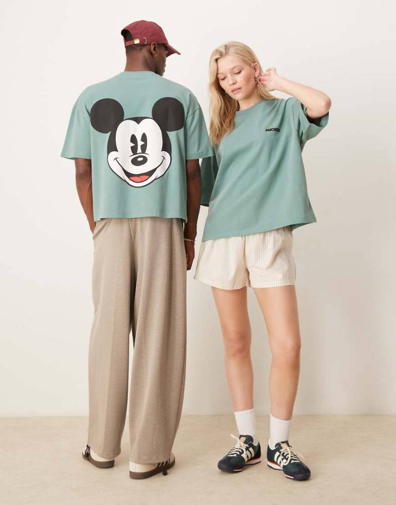 ASOS DESIGN - Disney - Kastiges Unisex-T-Shirt aus schwerem Material in Grün mit Oversize-Passform und Micky Maus-Prints von ASOS DESIGN