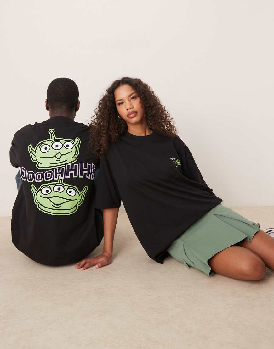 ASOS DESIGN - Disney Pixar - Unisex-T-Shirt in Schwarz mit Oversize-Schnitt und „Toy Story Alien"-Prints von ASOS DESIGN