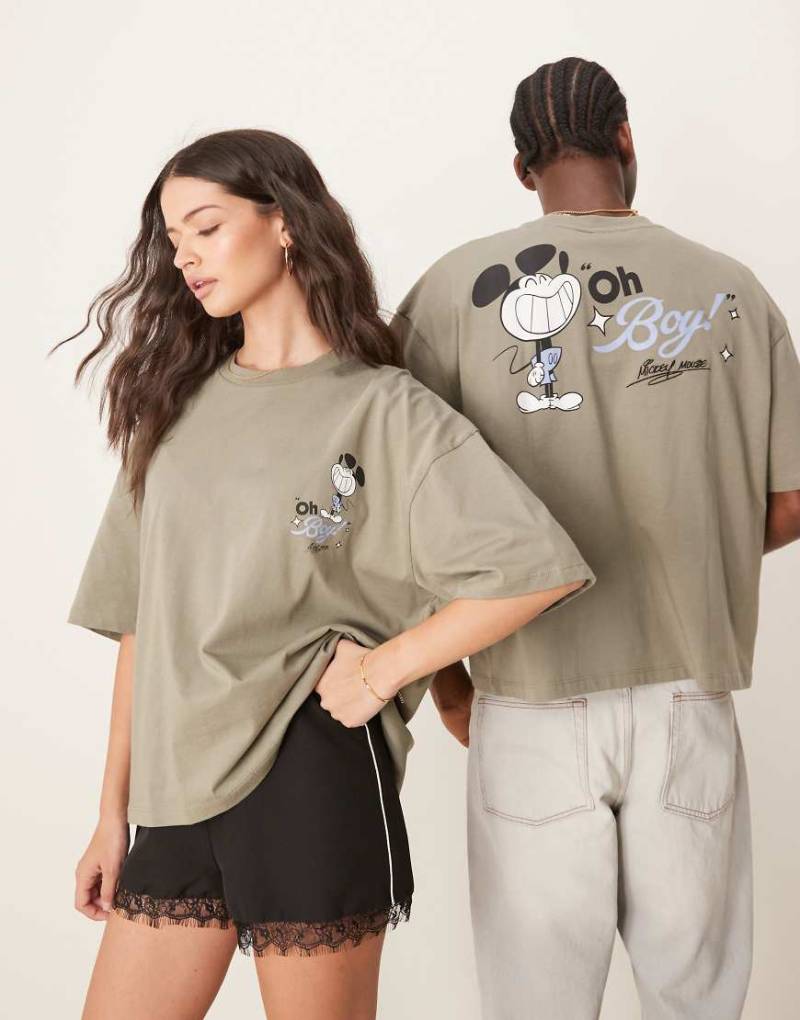 ASOS DESIGN - Disney - Unisex-T-Shirt in Khaki mit kastigem Oversize-Schnitt und „Mickey Mouse"-Prints-Grün von ASOS DESIGN