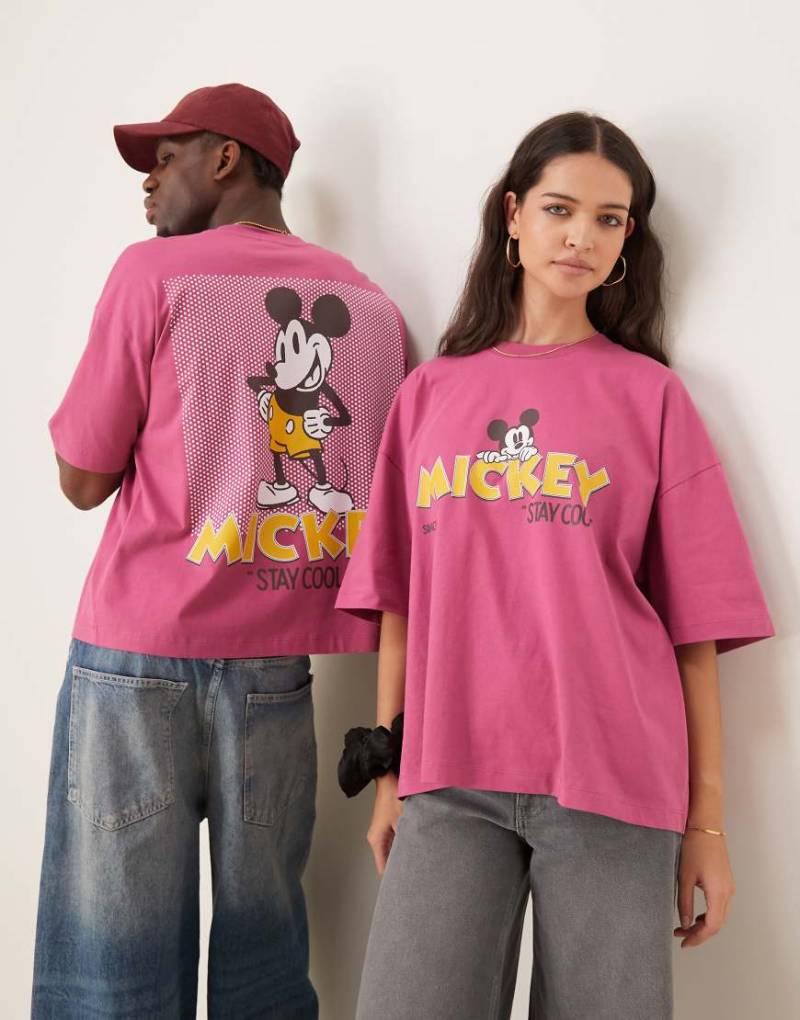 ASOS DESIGN - Disney - Unisex-T-Shirt in Rosa mit „Mickey Mouse"-Prints und Oversize-Schnitt von ASOS DESIGN