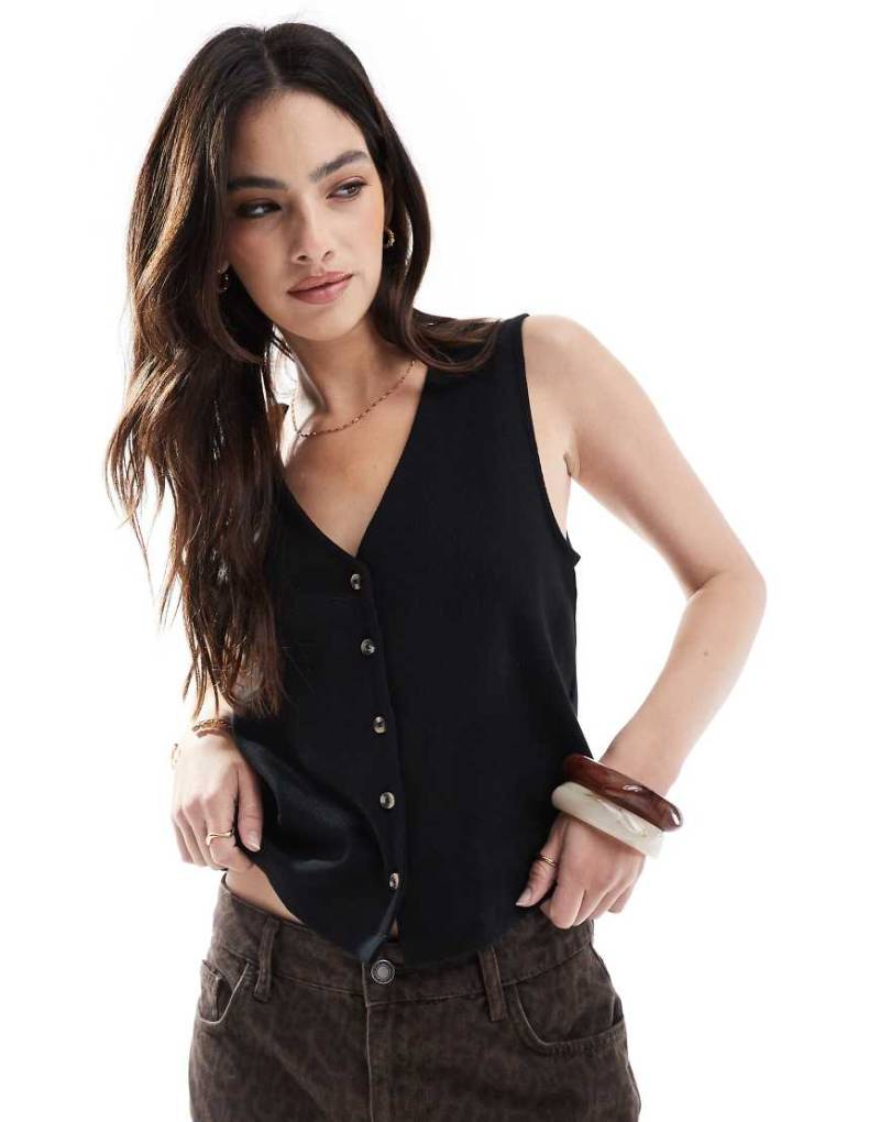 ASOS DESIGN - Durchgeknöpfte, gerippte Weste in Schwarz von ASOS DESIGN