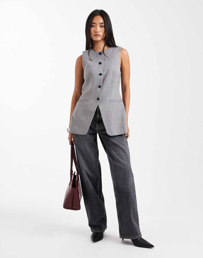 ASOS DESIGN - Elegante, hochgeschlossene Weste mit Fischgrätmuster in Schwarz-Weiß und geformter Taillenpartie-Bunt von ASOS DESIGN