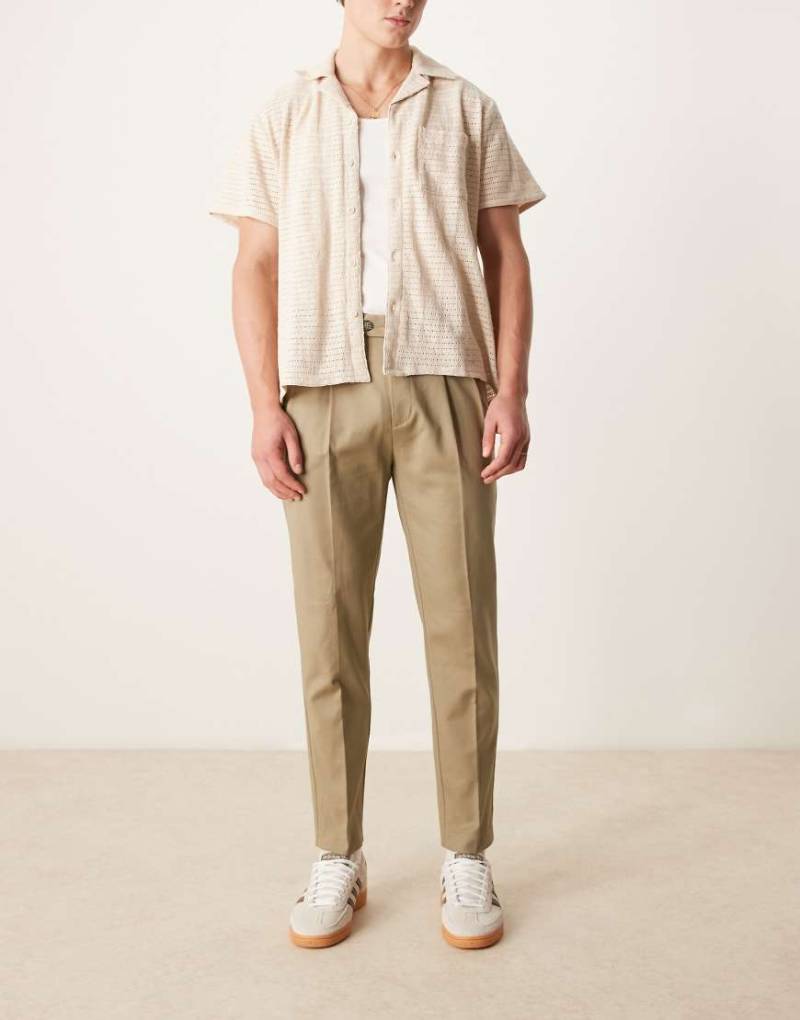 ASOS DESIGN - Elegante, schmal zulaufende Chinohose aus Baumwolle in Grün von ASOS DESIGN