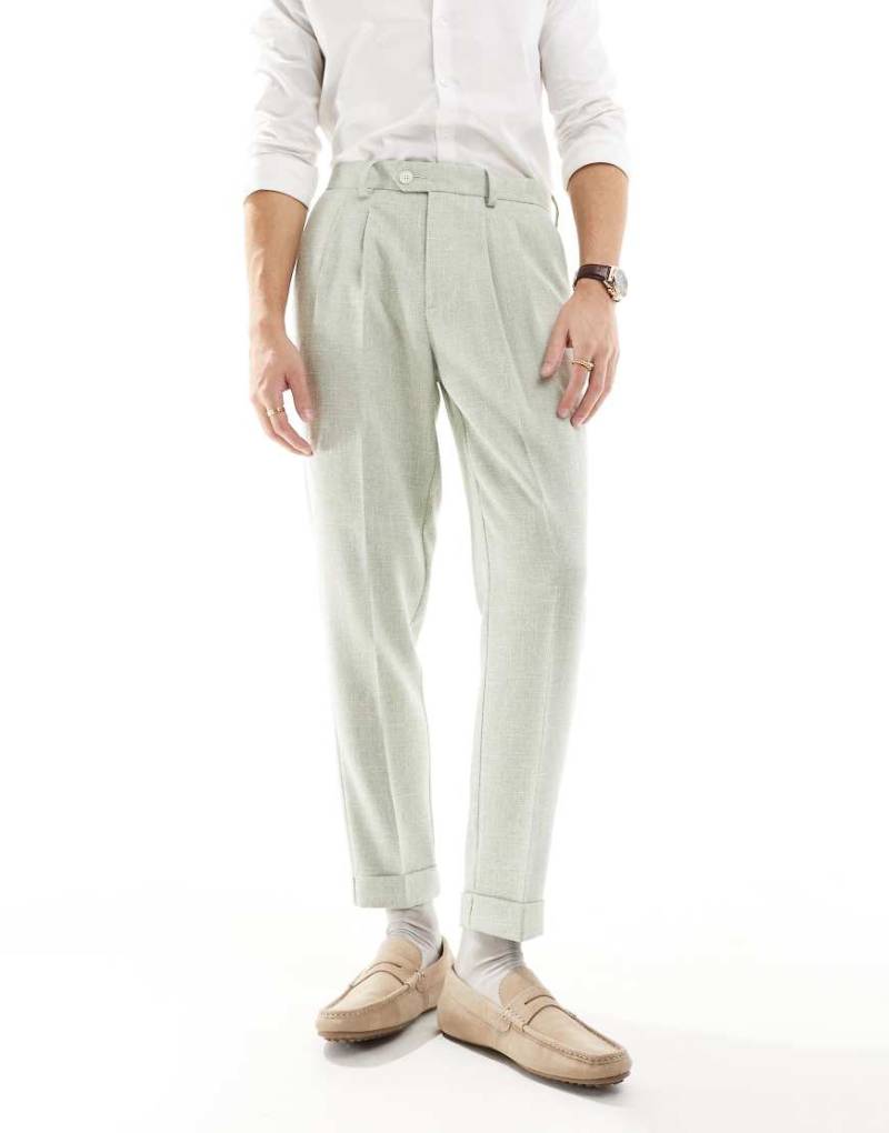ASOS DESIGN - Elegante, schmal zulaufende Chinohose aus strukturiertem Material in Staubgrün von ASOS DESIGN