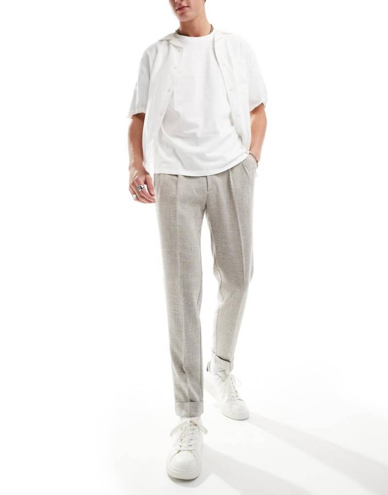 ASOS DESIGN - Elegante, schmal zulaufende Chinohose in Hellbraun mit Struktur von ASOS DESIGN