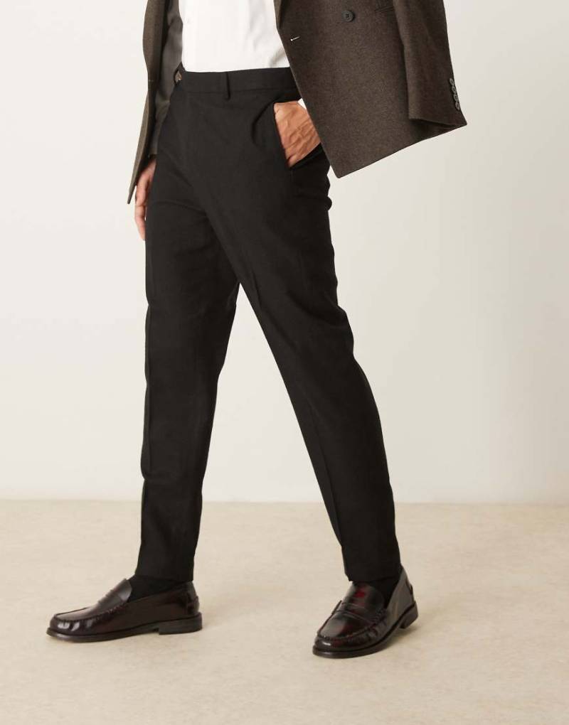 ASOS DESIGN - Elegante, schmal zulaufende Hose aus Wollmix in Schwarz von ASOS DESIGN