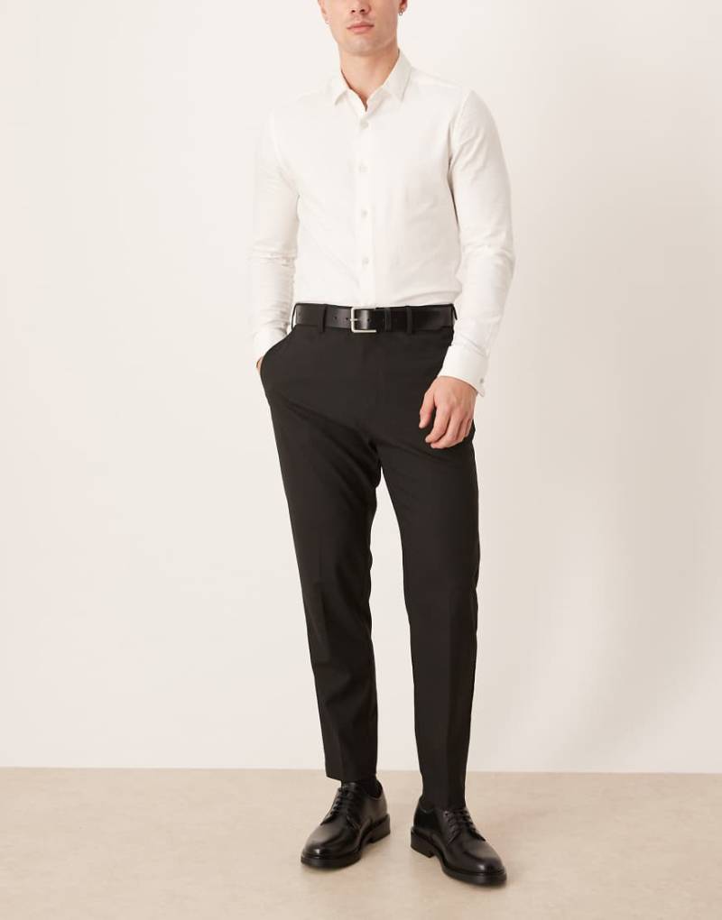 ASOS DESIGN - Elegante, schmal zulaufende Hose in Schwarz von ASOS DESIGN