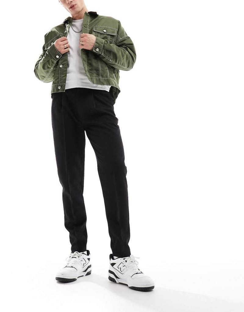 ASOS DESIGN - Elegante, schmal zulaufende Hose in Schwarz von ASOS DESIGN