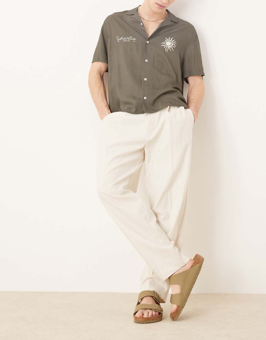 ASOS DESIGN - Elegante, schmal zulaufende Oversize-Hose aus Leinenmix in Weiß mit Bundfalten ASOS DESIGN - Elegante, schmal zulaufende Oversize-Hose aus Leinenmix in Weiß mit Bundfalten von ASOS DESIGN