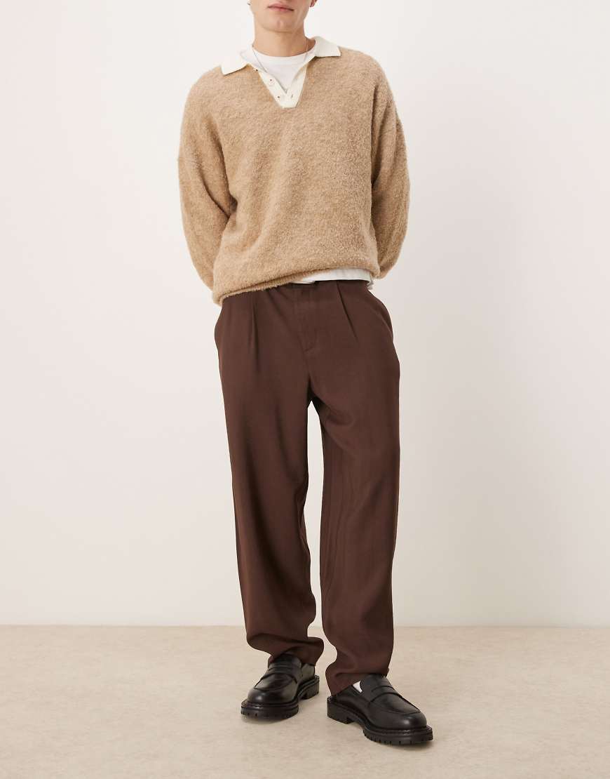 ASOS DESIGN - Elegante, schmal zulaufende Oversize-Hose in Braun ASOS DESIGN - Elegante, schmal zulaufende Oversize-Hose in Braun von ASOS DESIGN