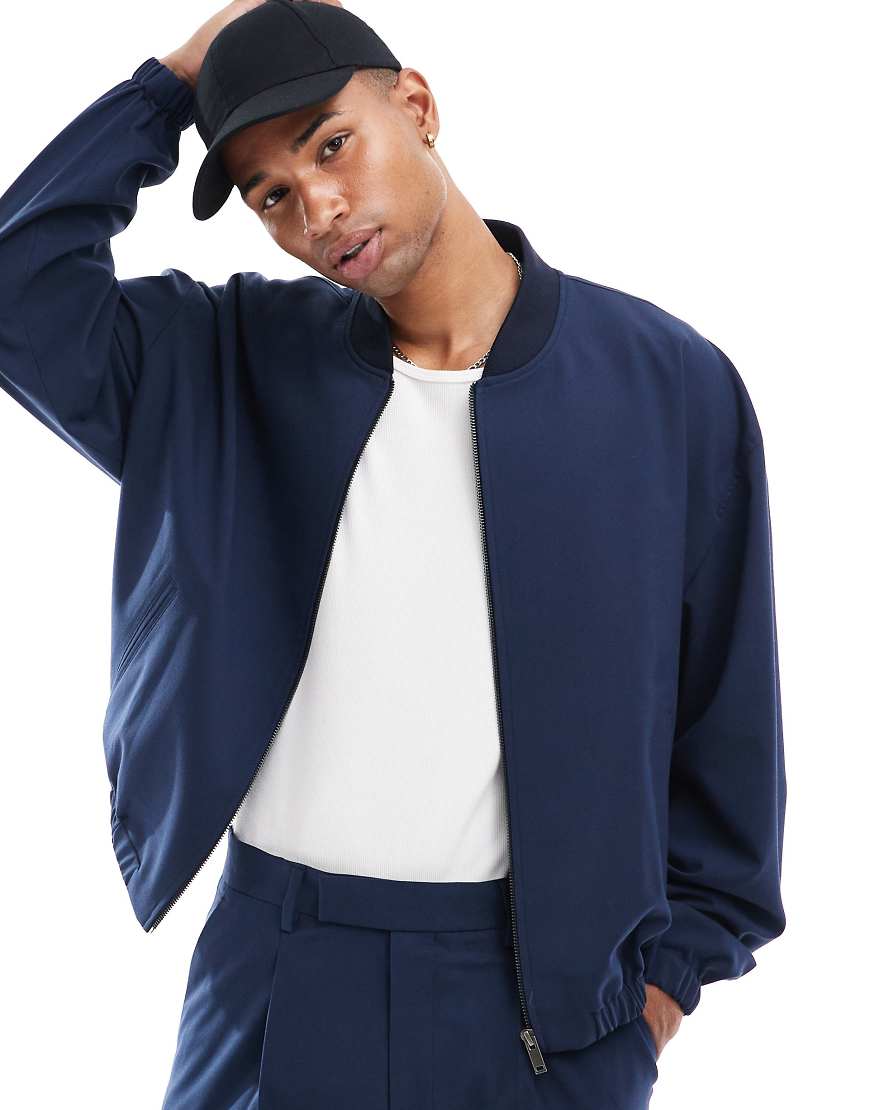 ASOS DESIGN - Elegante Bomberjacke in Marineblau mit Taschen, Kombiteil von ASOS DESIGN