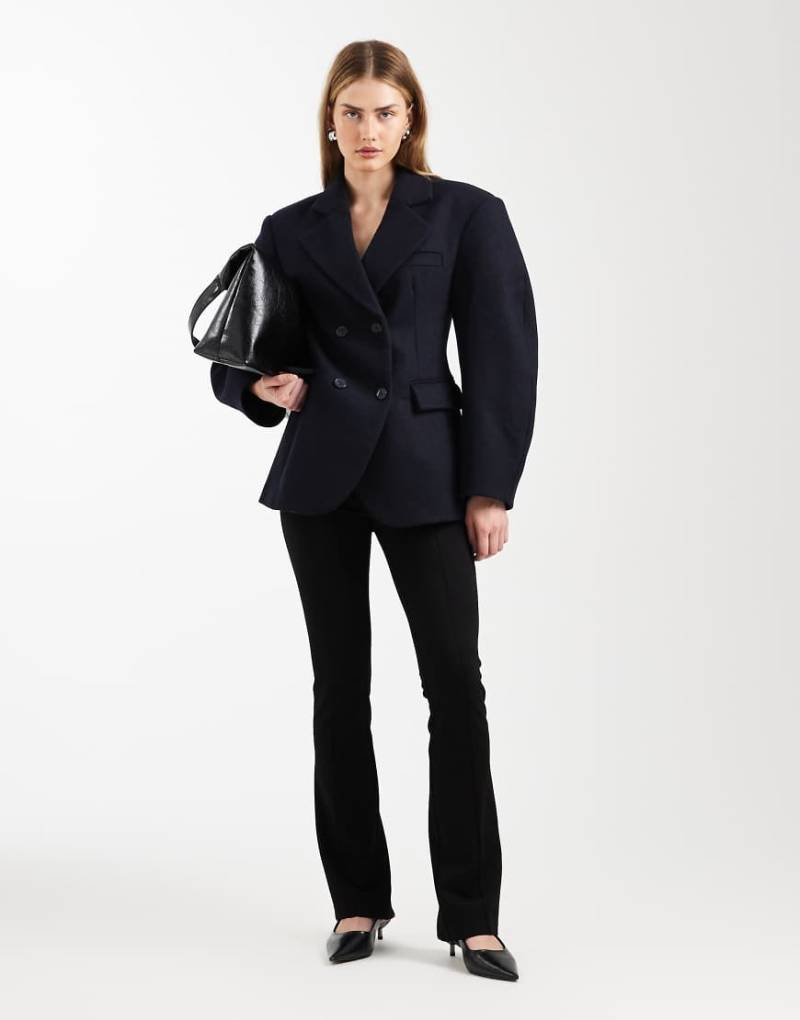 ASOS DESIGN - Elegante Hose aus Ponte in Schwarz mit engem Schnitt und Saumschlitz von ASOS DESIGN