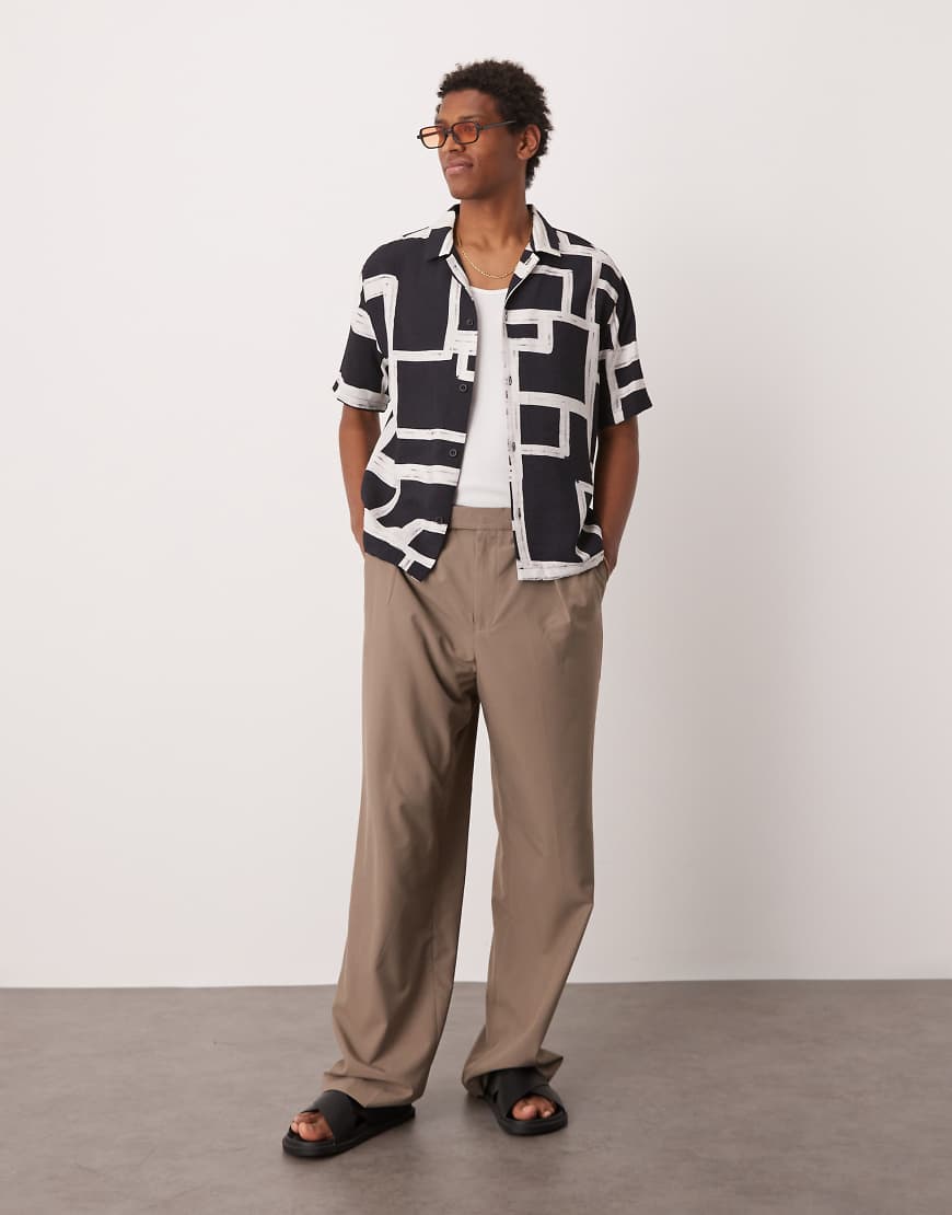 ASOS DESIGN - Elegante Hose in Beige mit weitem Bein und Stretch-Taillenbund-Neutral von ASOS DESIGN