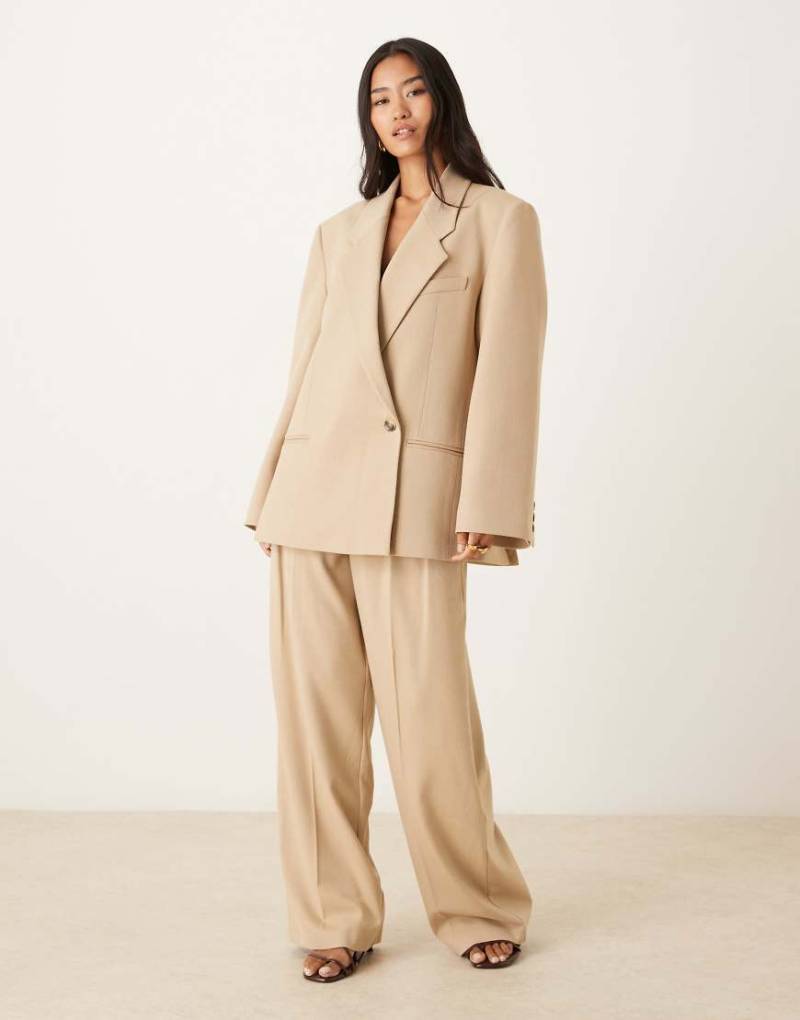 ASOS DESIGN - Elegante Hose in Sand mit weitem Schnitt und Zierlasche-Neutral von ASOS DESIGN