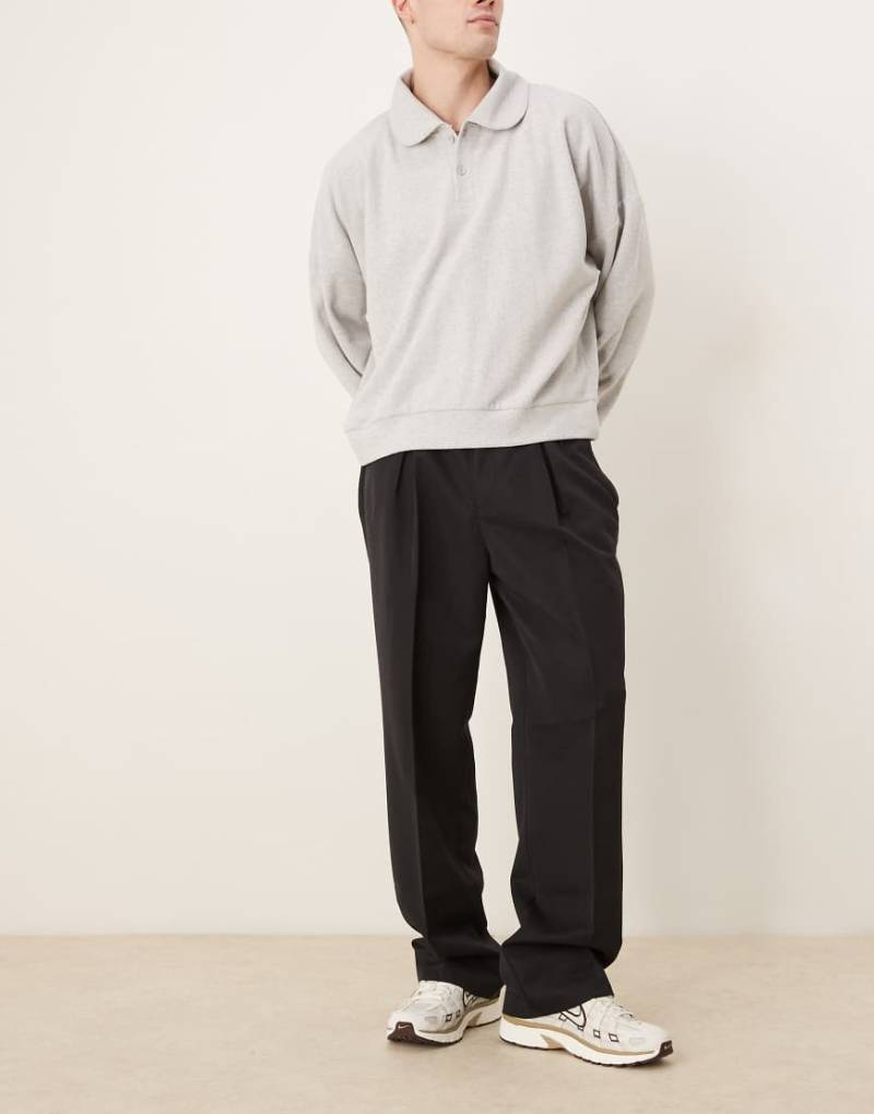 ASOS DESIGN - Elegante Hose in Schwarz mit weitem Bein, elastischem Bund und Kellerfalten ASOS DESIGN - Elegante Hose in Schwarz mit weitem Bein, elastischem Bund und Kellerfalten von ASOS DESIGN