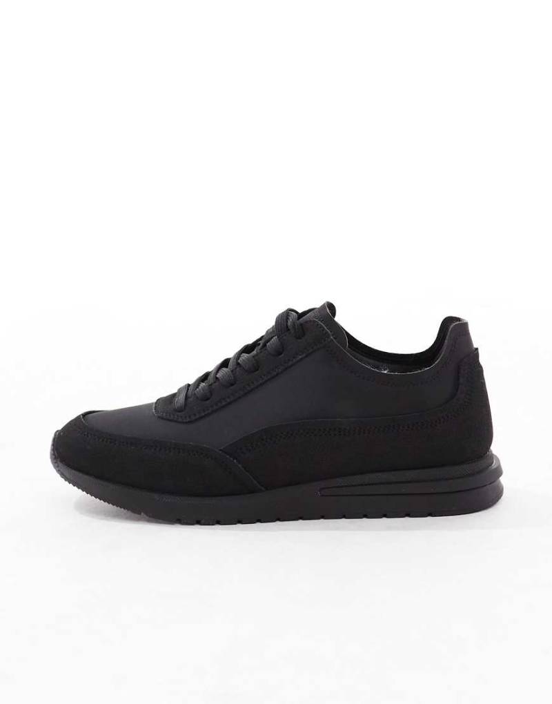 ASOS DESIGN - Elegante Runner-Sneaker in Schwarz-Grau von ASOS DESIGN