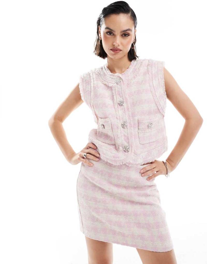 ASOS DESIGN - Eleganter A-Linien-Minirock aus Bouclé in Rosa von ASOS DESIGN