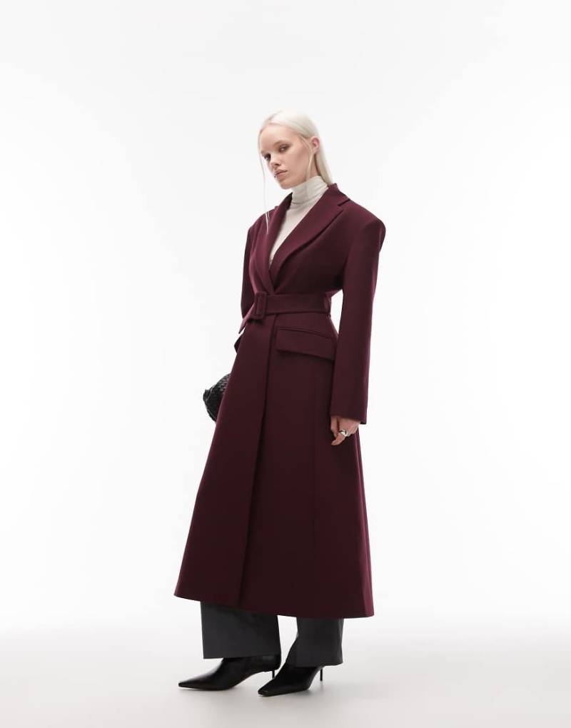 ASOS DESIGN - Eleganter Mantel in Pflaumenlila mit markanten Schulterpolstern und Bindegürtel von ASOS DESIGN