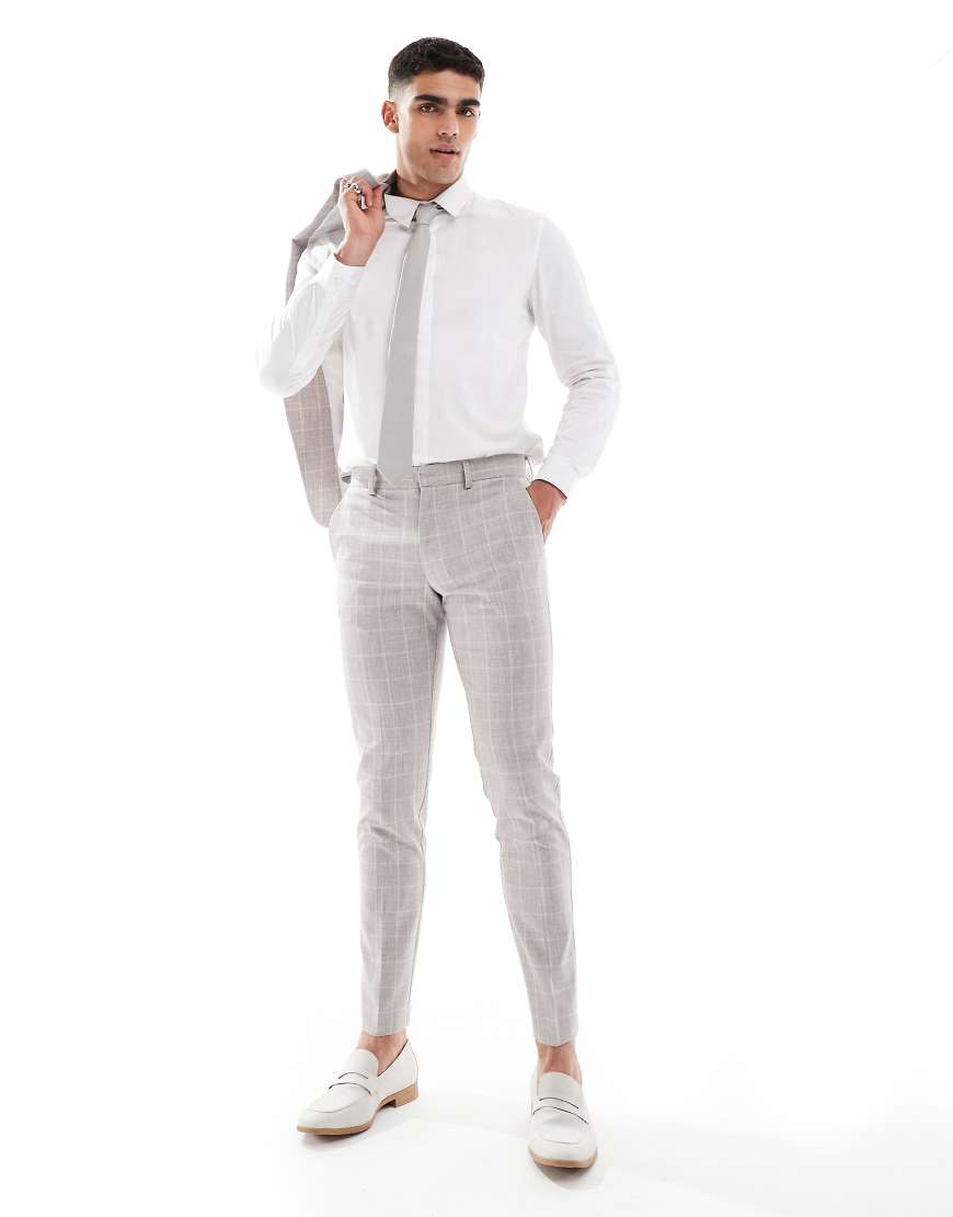 ASOS DESIGN - Eng geschnittene Anzughose in Beige mit großem Karomuster-Neutral ASOS DESIGN - Eng geschnittene Anzughose in Beige mit großem Karomuster-Neutral von ASOS DESIGN