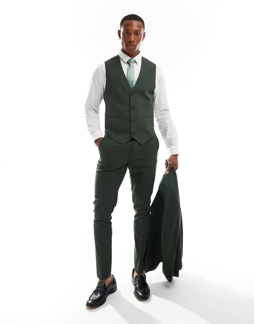ASOS DESIGN - Eng geschnittene Anzughose in Dunkelgrün ASOS DESIGN - Eng geschnittene Anzughose in Dunkelgrün von ASOS DESIGN