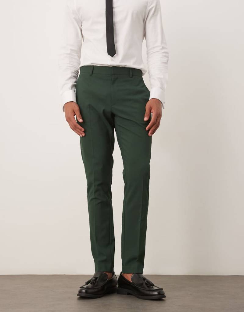 ASOS DESIGN - Eng geschnittene Anzughose in Dunkelgrün von ASOS DESIGN