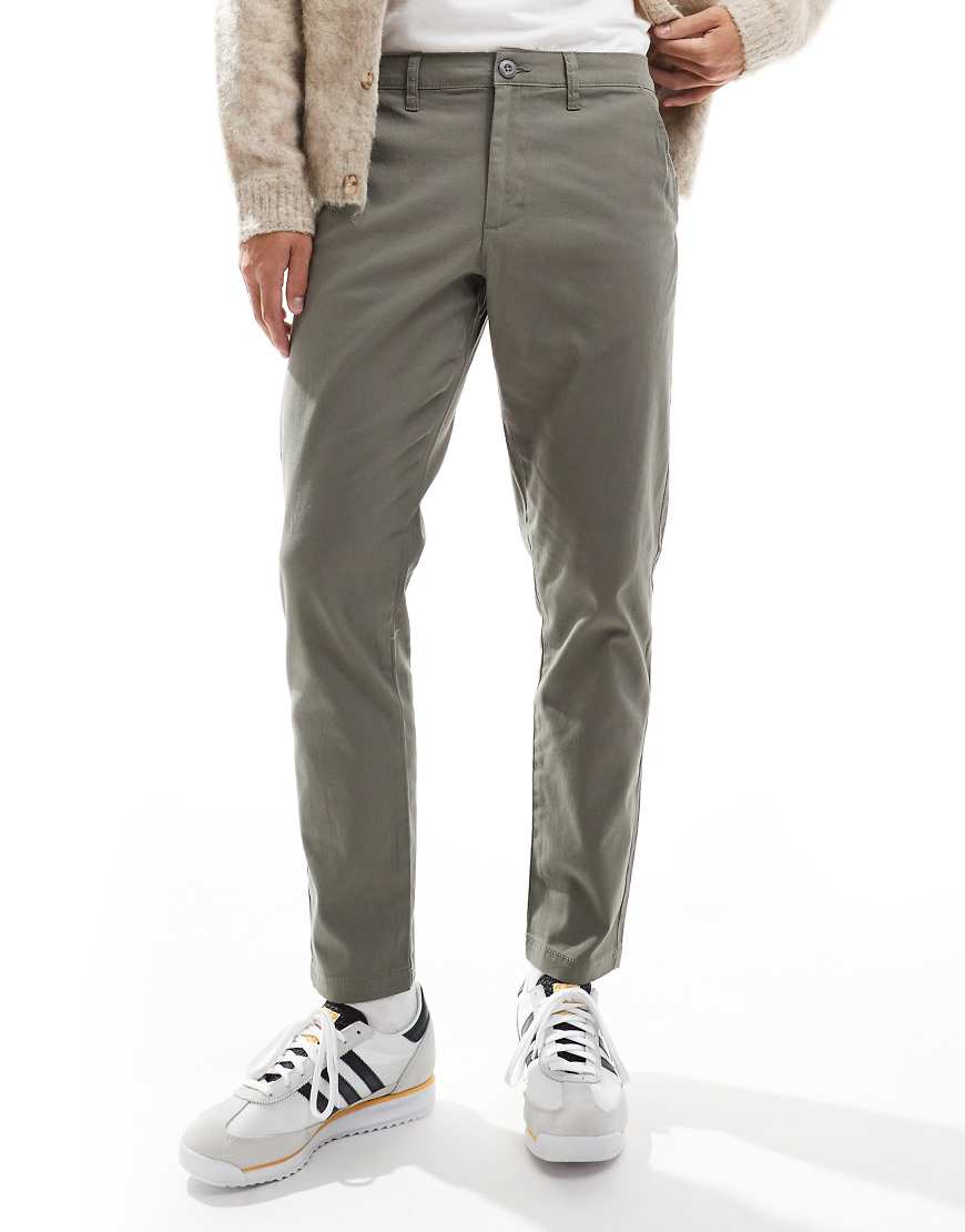 ASOS DESIGN - Eng geschnittene Chinohose in Anthrazit-Grau ASOS DESIGN - Eng geschnittene Chinohose in Anthrazit-Grau von ASOS DESIGN