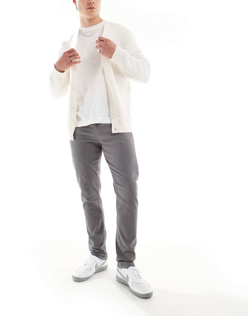 ASOS DESIGN - Eng geschnittene Chinohose in Anthrazit-Grau ASOS DESIGN - Eng geschnittene Chinohose in Anthrazit-Grau von ASOS DESIGN