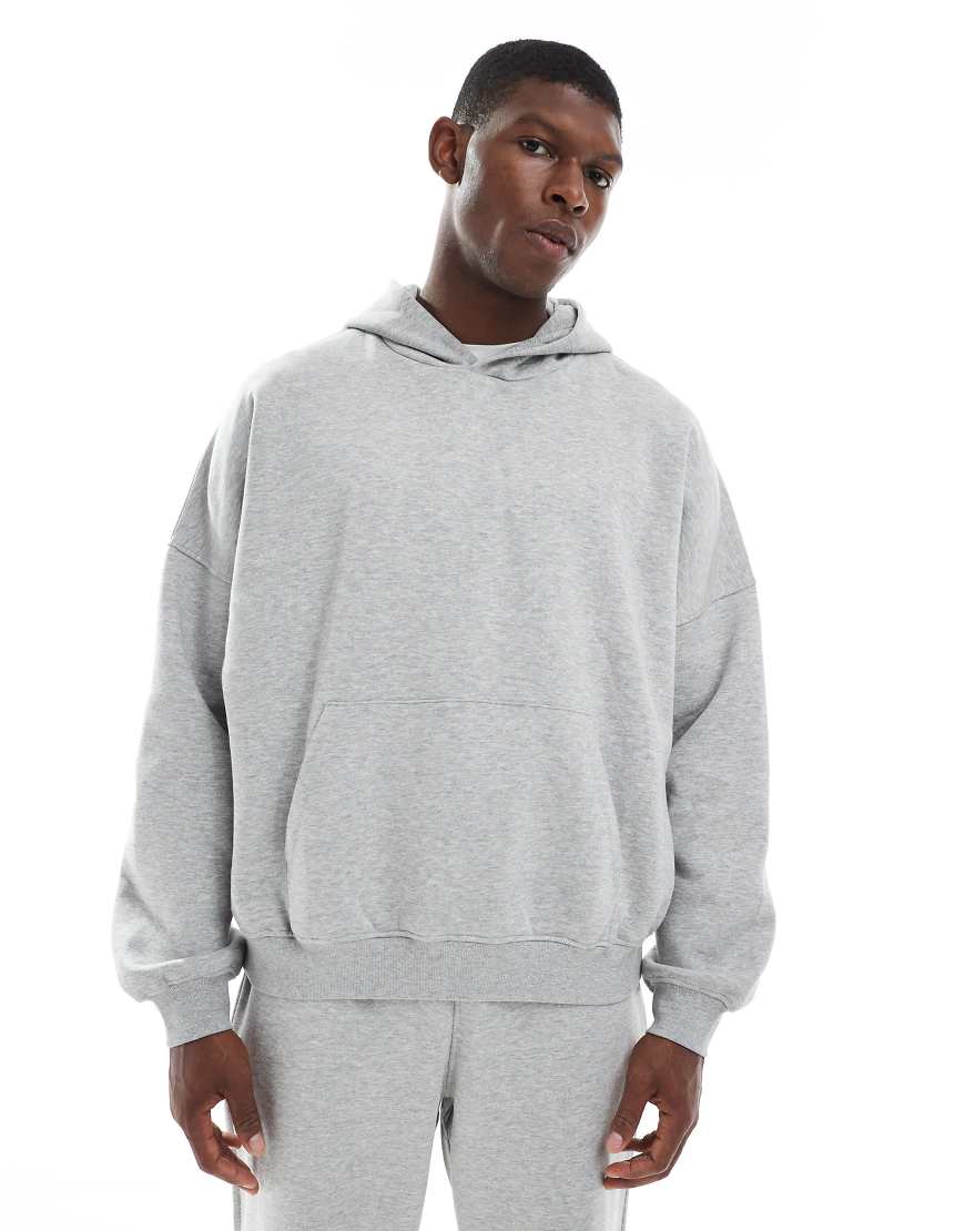ASOS DESIGN - Essential - Extremer Oversize-Kapuzenpullover in Grau meliert von ASOS DESIGN