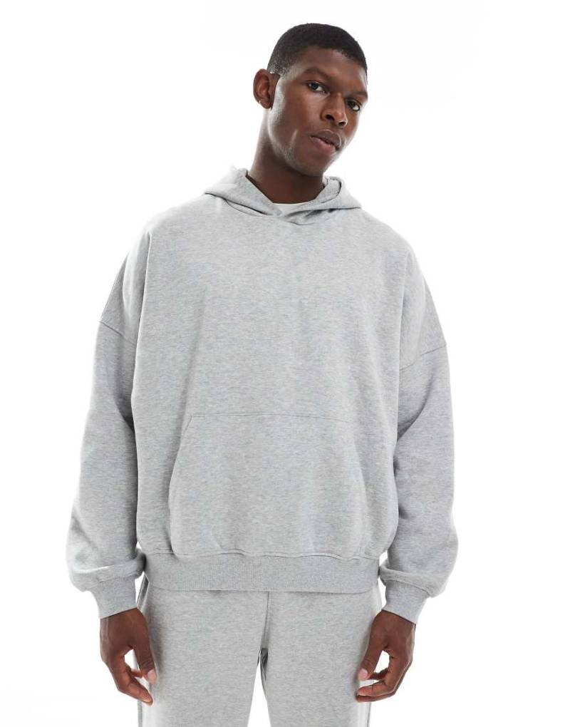 ASOS DESIGN - Basic-Kapuzenpullover in meliertem Grau mit Super-Oversize-Schnitt von ASOS DESIGN