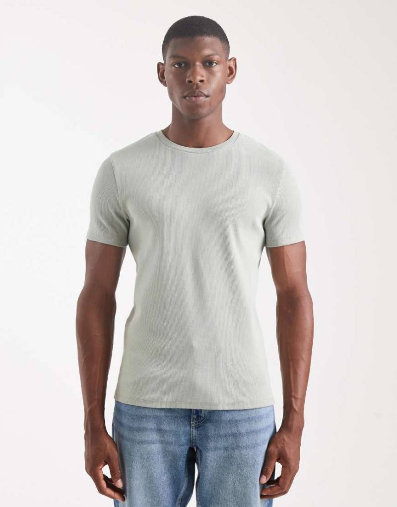 ASOS DESIGN - Essential - Geripptes Muskel-T-Shirt in Hellgrün von ASOS DESIGN