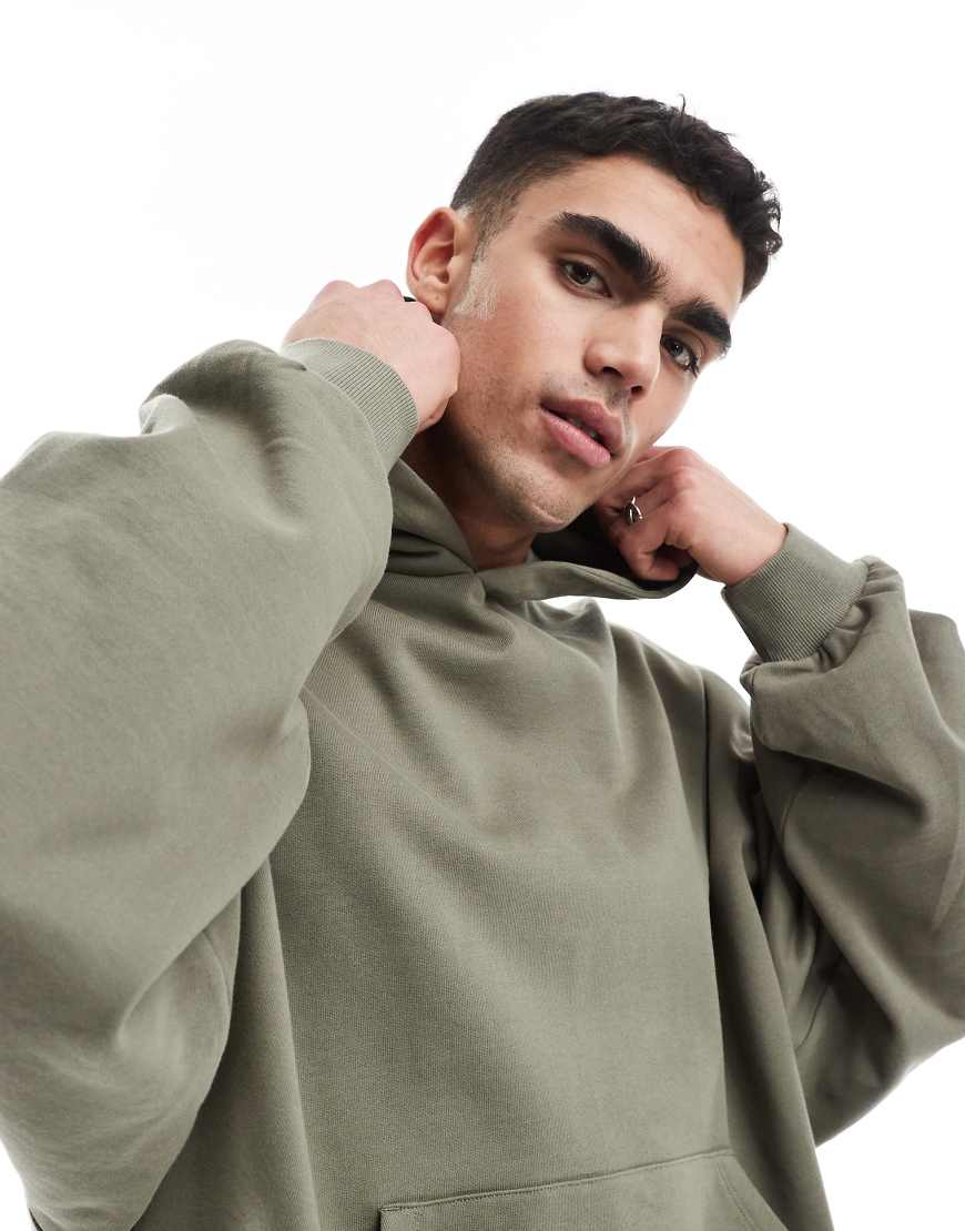 ASOS DESIGN - Essential - Kapuzenpullover in Khaki mit extremer Oversize-Passform-Grün ASOS DESIGN - Essential - Kapuzenpullover in Khaki mit extremer Oversize-Passform-Grün von ASOS DESIGN