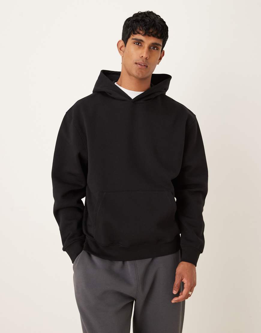 ASOS DESIGN - Essentials - Locker geschnittener Kapuzenpullover in Schwarz von ASOS DESIGN