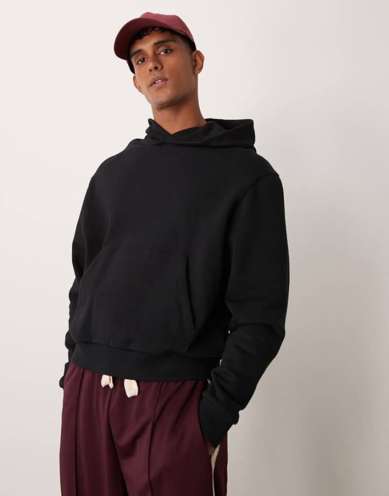 ASOS DESIGN - Essential - Kastiger Oversize-Kapuzenpullover in Schwarz von ASOS DESIGN